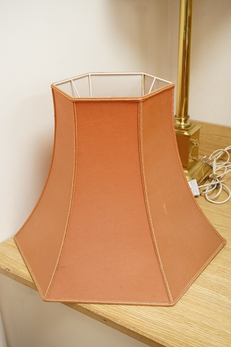 A large pair of modern brass column table lamps with shades, 100cm high